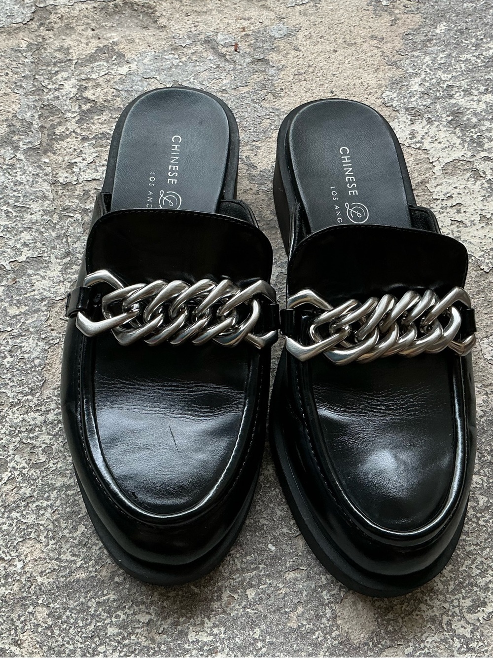 Chinese Laundry Black Slip-On Loafers with Silver Chain Accent
